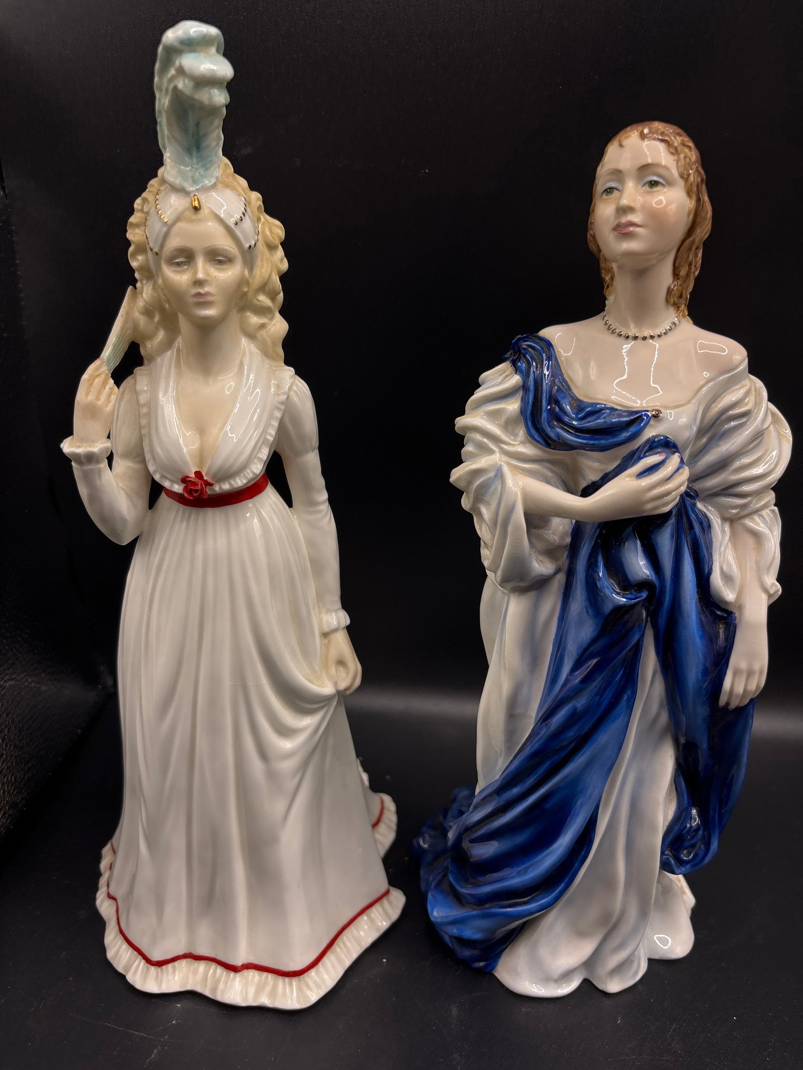 Two limited edition Coalport ‘History of Costume’ bone china 11 inch figurines: No boxes…Two Coalport bone china figurine from the "History of Costume" series, specifically the House of Stuart (1603-1714) edition and "House of Hanover 1790-1837".It is a limited edition piece,