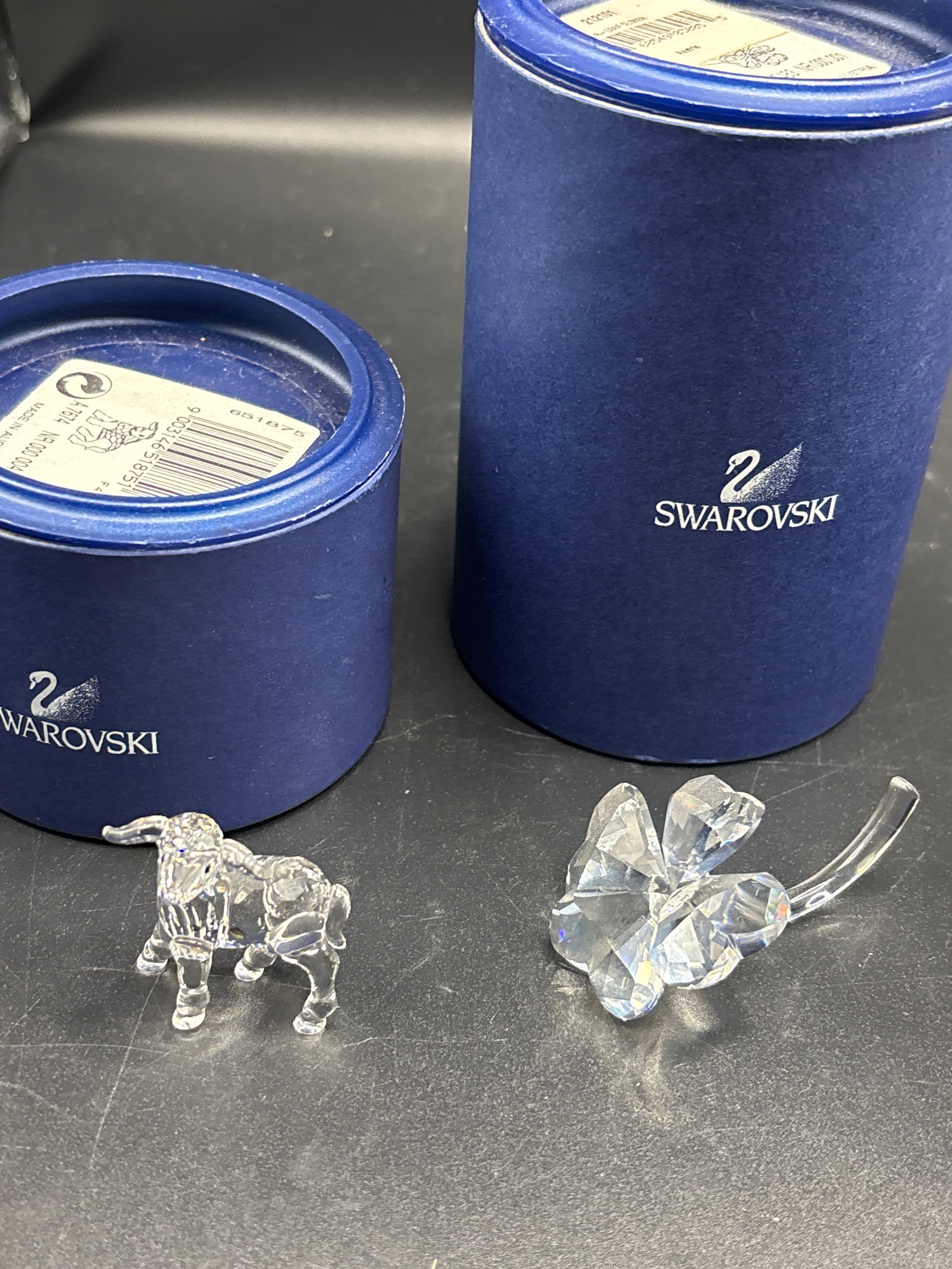 Two Swarovski; 100% Original Authentic Genuine Swarovski Crystal: With original boxes…Two Swarovski; 100% Original Authentic Genuine Swarovski Crystal 1&1/2 inch Swarovski Little lamb and 2&1/2 inch retired Swarovski crystal four-leaf clover figurine, model