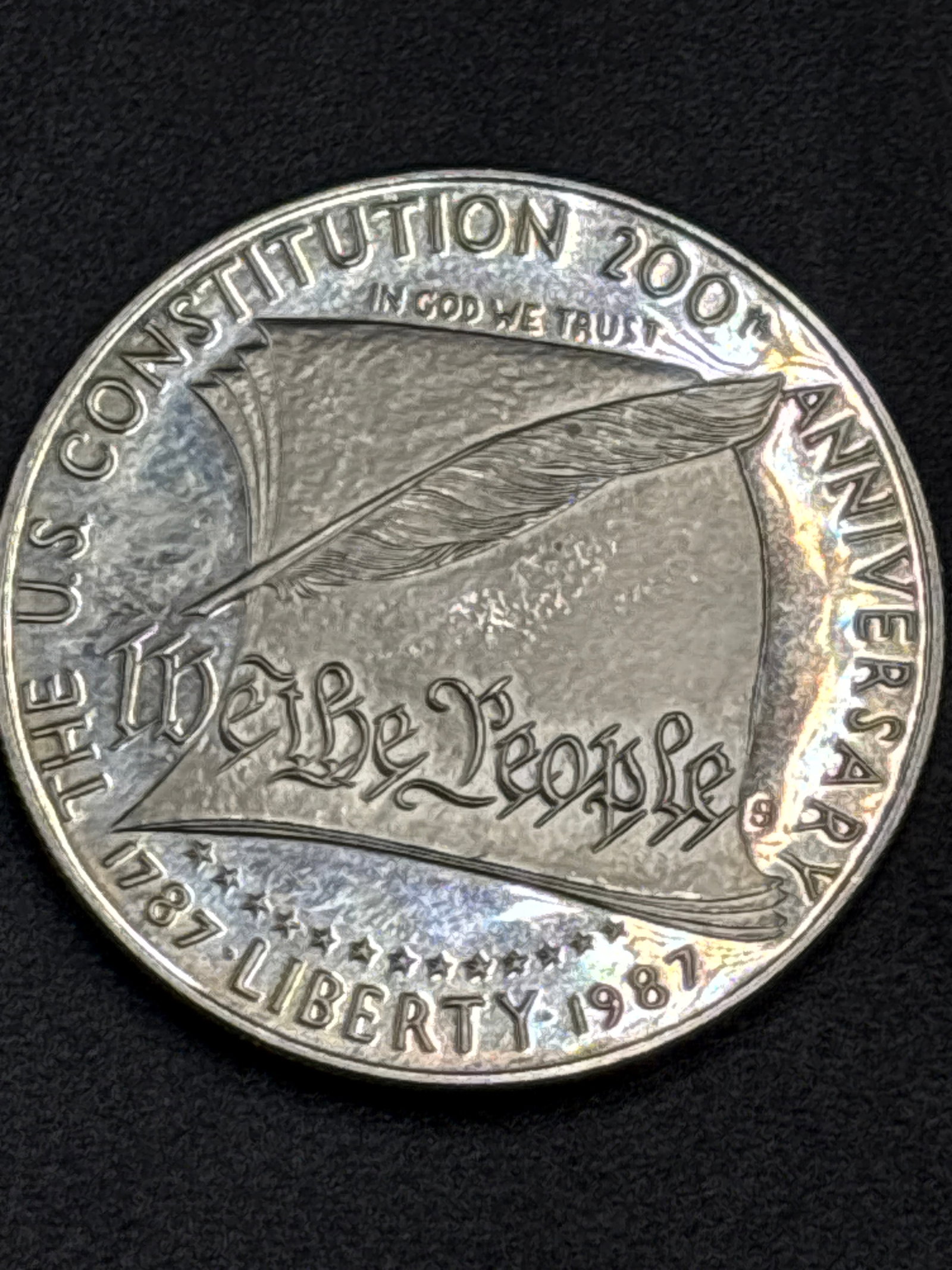 27 grams .925 silver 1987-S United States Constitution Bicentennial Silver Dollar: 1987-S United States Constitution Bicentennial Silver Dollar.The coin is composed of 90% silver.It was struck in San Francisco to commemorate the 200th anniversary of the U.S. Constitution.Current lis