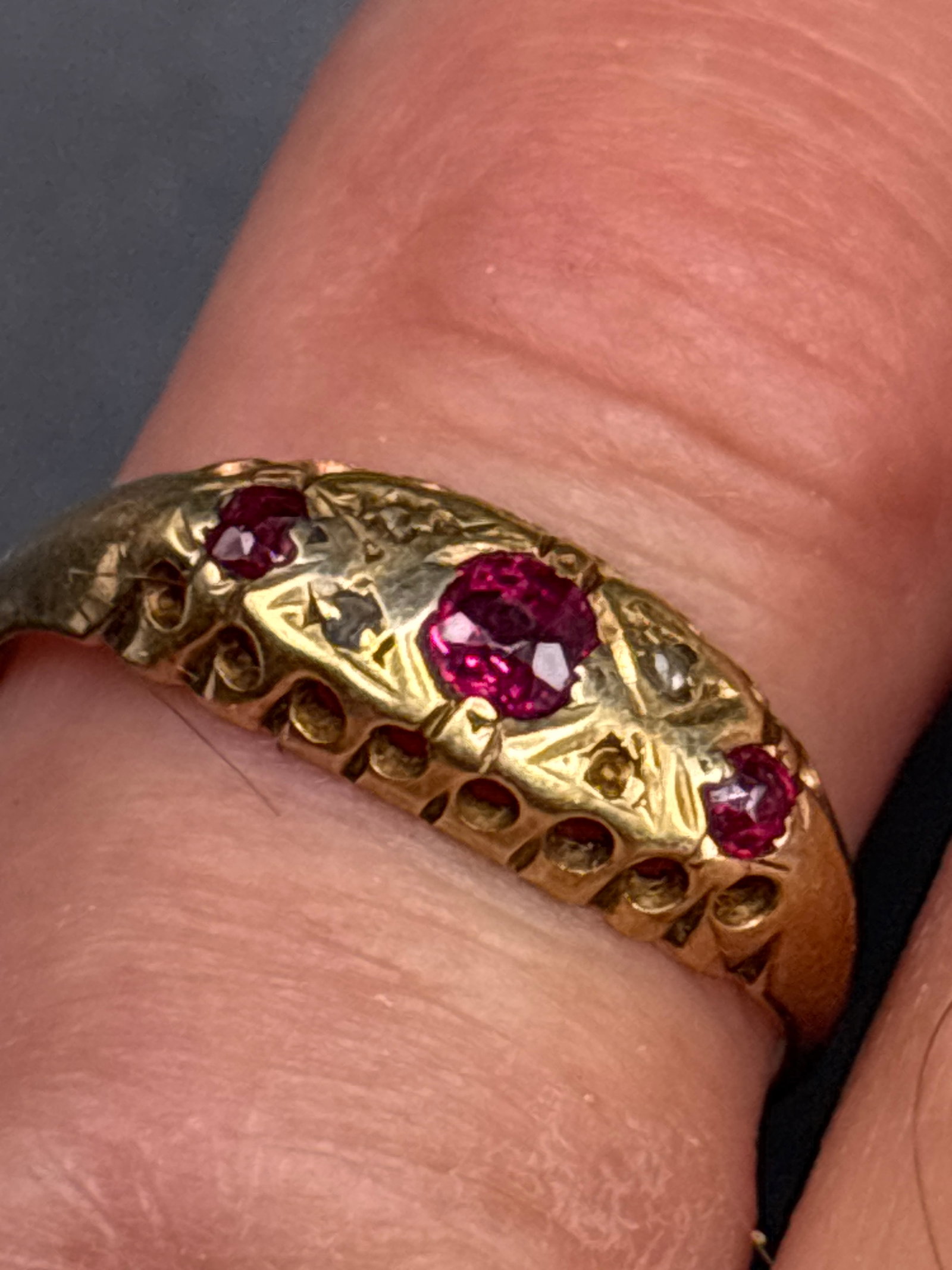 vintage 2.16 grams 18 k gold ring antique Edwardian ruby & diamonds ring: vintage 2.16 grams 18 k gold ring antique Edwardian ring features three oval rubies interspersed with diamond accents.Period: The style is consistent with the Edwardian or late Victorian era, circa