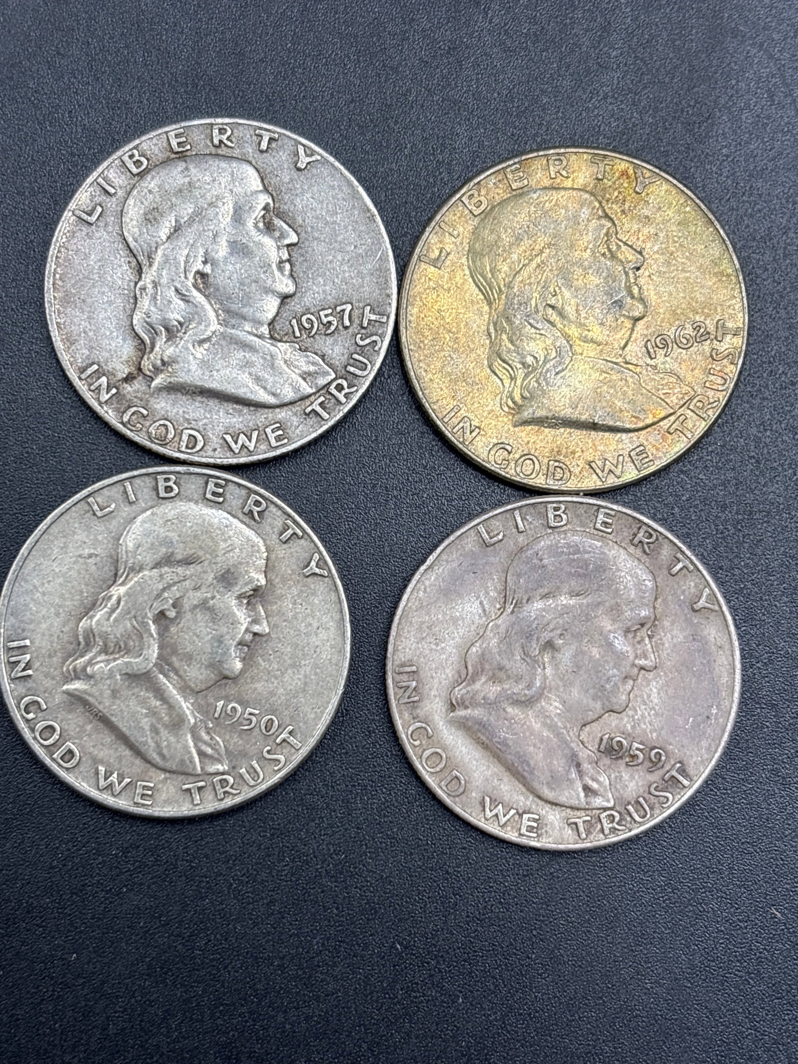 Four silver Benjamin Franklin Half DollarS (1 of 6)