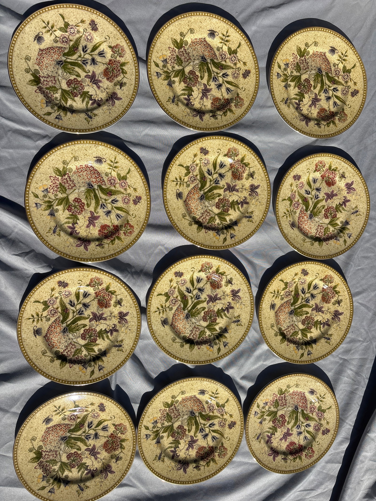 Set of twelve Wedgwood Floral Tapestry pattern fine bone china 7inch B&B plates: Set of twelve fine bone china bread & butter plates featuring the Wedgwood Floral Tapestry pattern.Pattern DetailsManufacturer: Produced by the renowned British company Wedgwood.Production Era: This s