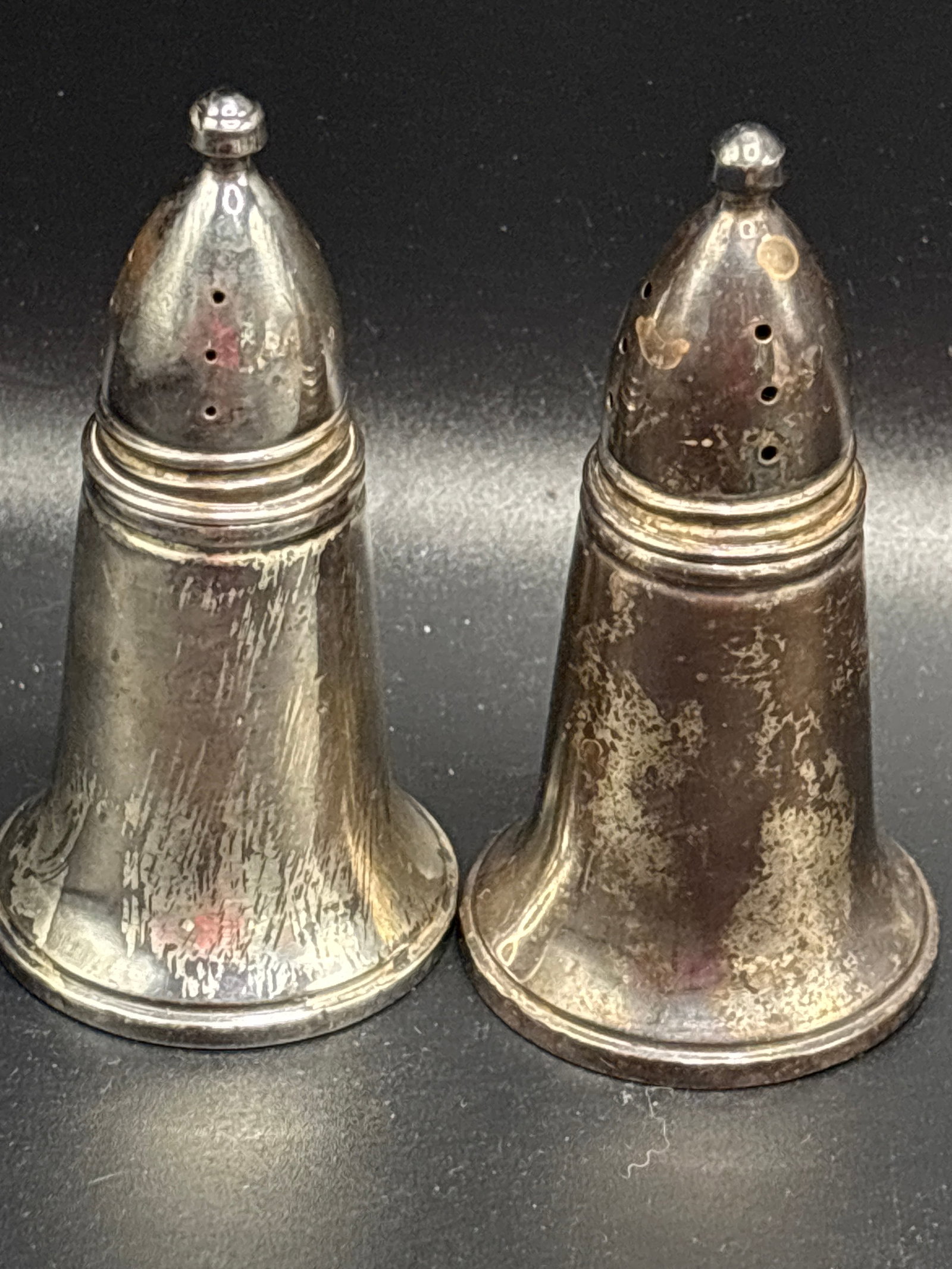 Pair vintage weighted sterling silver 3&1/2 inch salt & pepper shakers,: vintage weighted sterling silver salt & pepper shakers, closely resembling mid-20th-century bell-shaped designs by makers like Duchin Creation or Crown Silver Co.Material: Composed of a thin shell of 