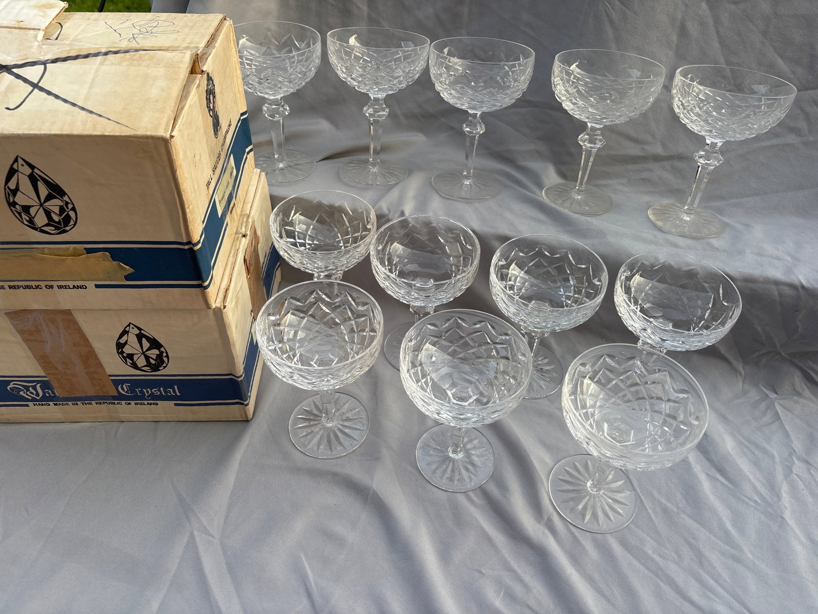 Set of twelve vintage Waterford Crystal Powerscourt pattern stemware: Set of twelve vintage Waterford Crystal stemware in the popular Powerscourt pattern. Specifically, this particular shape is designated as a Champagne Coupe or Tall Sherbet glass.The Powerscourt