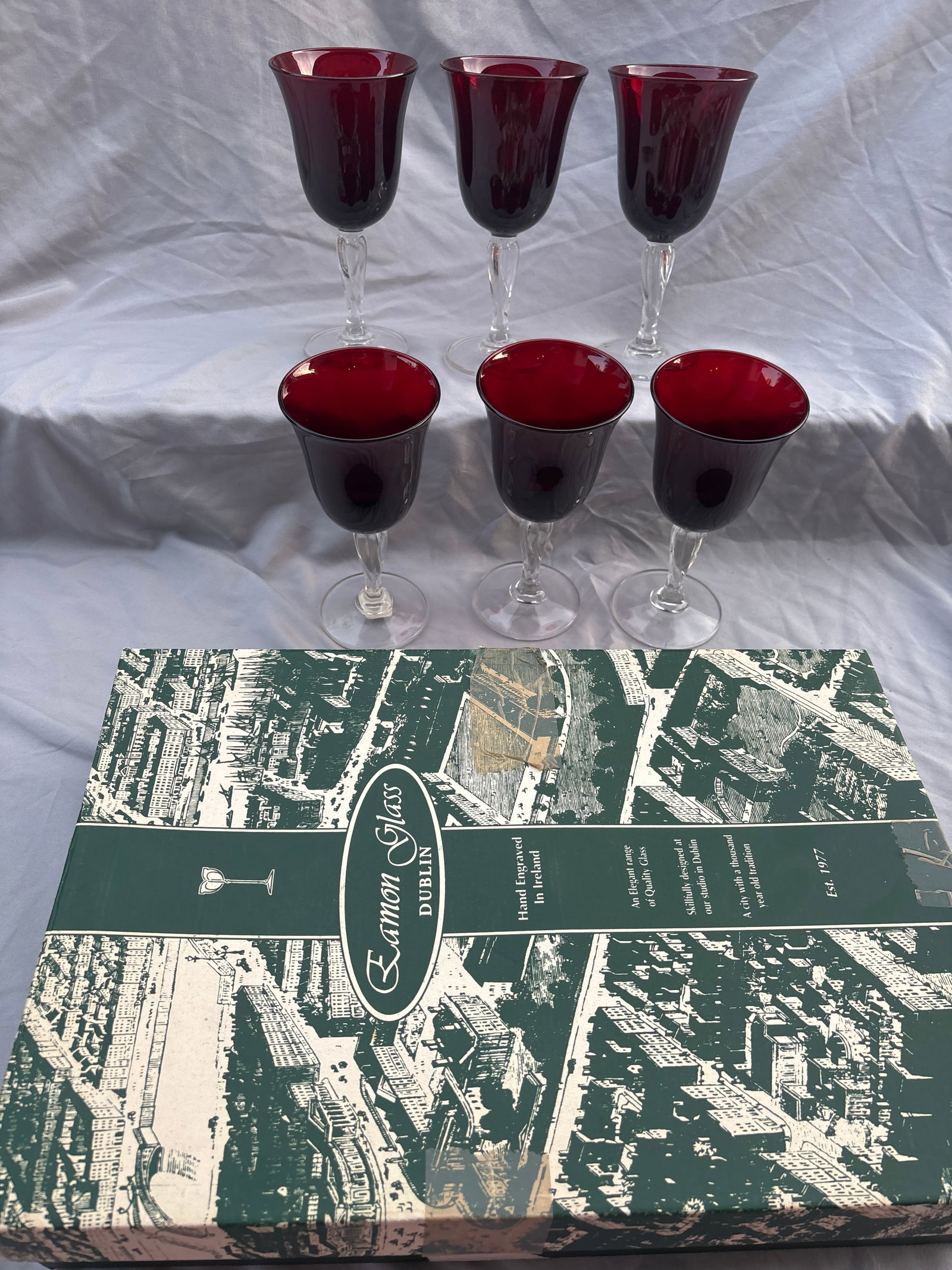 vintage set of six ruby red 7&1/2 inch stemware; Eamon glass, Dublin, Ireland: vintage set of six ruby red stemware accompanied by its original box from Eamon Glass (Dublin, Ireland), which was established in 1977.About the GlasswareBrand/Origin: Eamon Glass Co. operated out of