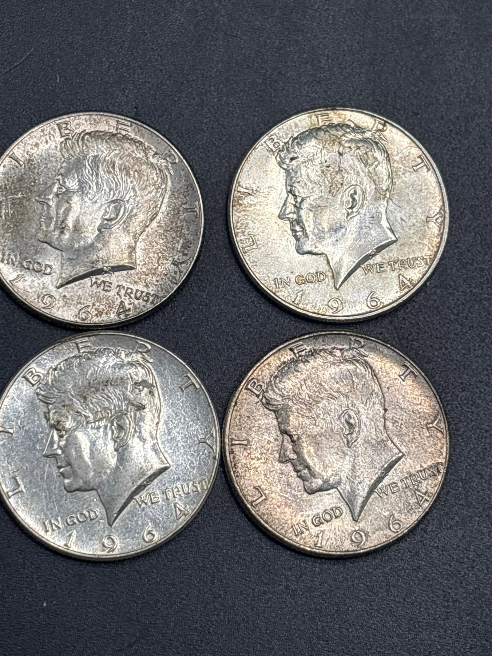 Four silver 1964 Kennedy US half dollars (1 of 4)