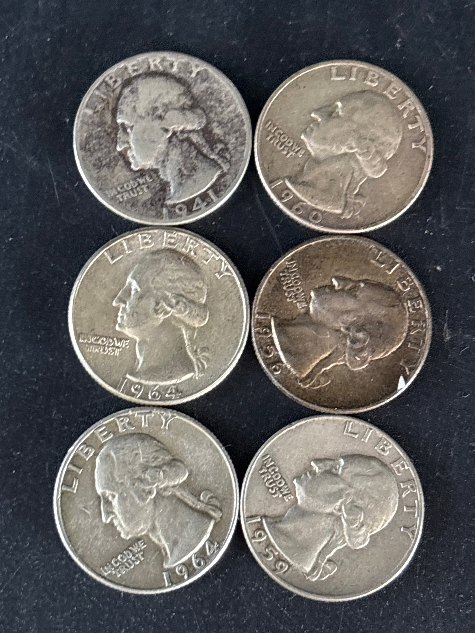 Six silver George Washington Quarters: Six George Washington Quarters, which is composed of 90% silver and 10% copper.Composition: Contains 0.18084 troy oz of pure silver, making it a valuable "junk silver" coin.Mint Year: 1964 was the fin