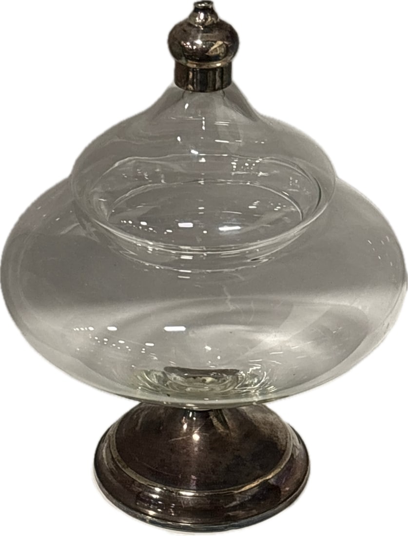 Vintage sterling silver weighted base 8 inch covered candy compote: vintage Duchin Creation weighted sterling silver and crystal apothecary candy dish with a lid. Material: Features a clear crystal glass body with weighted sterling silver for the base and lid top. Des