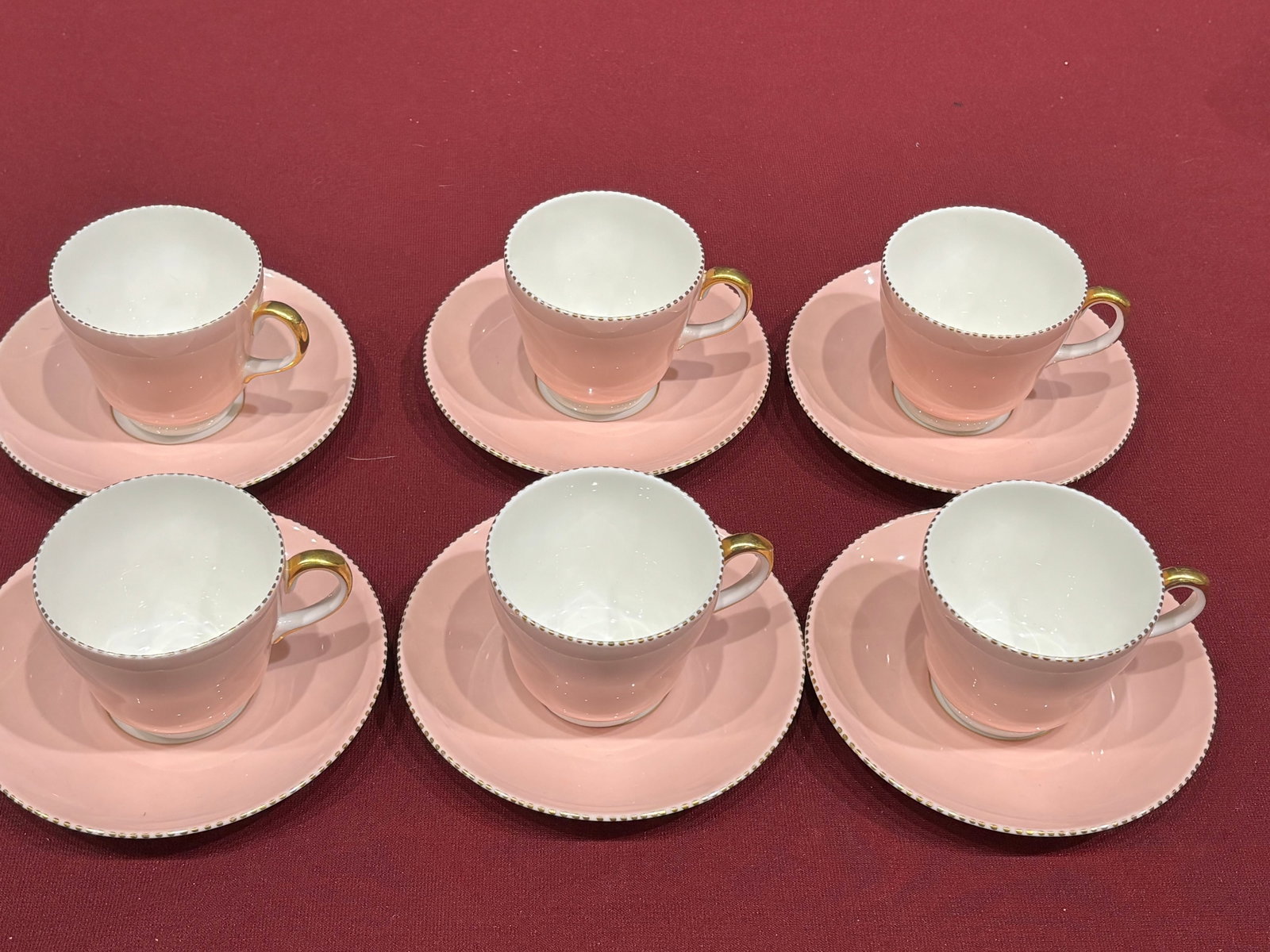 stunning set of six vintage Wedgwood bone china 'April Pink' teacups and saucers: stunning set of vintage Wedgwood bone china teacups and saucers in the highly collectible "April Pink" pattern. [1, 2]Design Features & Details* The Pattern: Known as "April Pink" (sometimes cataloged