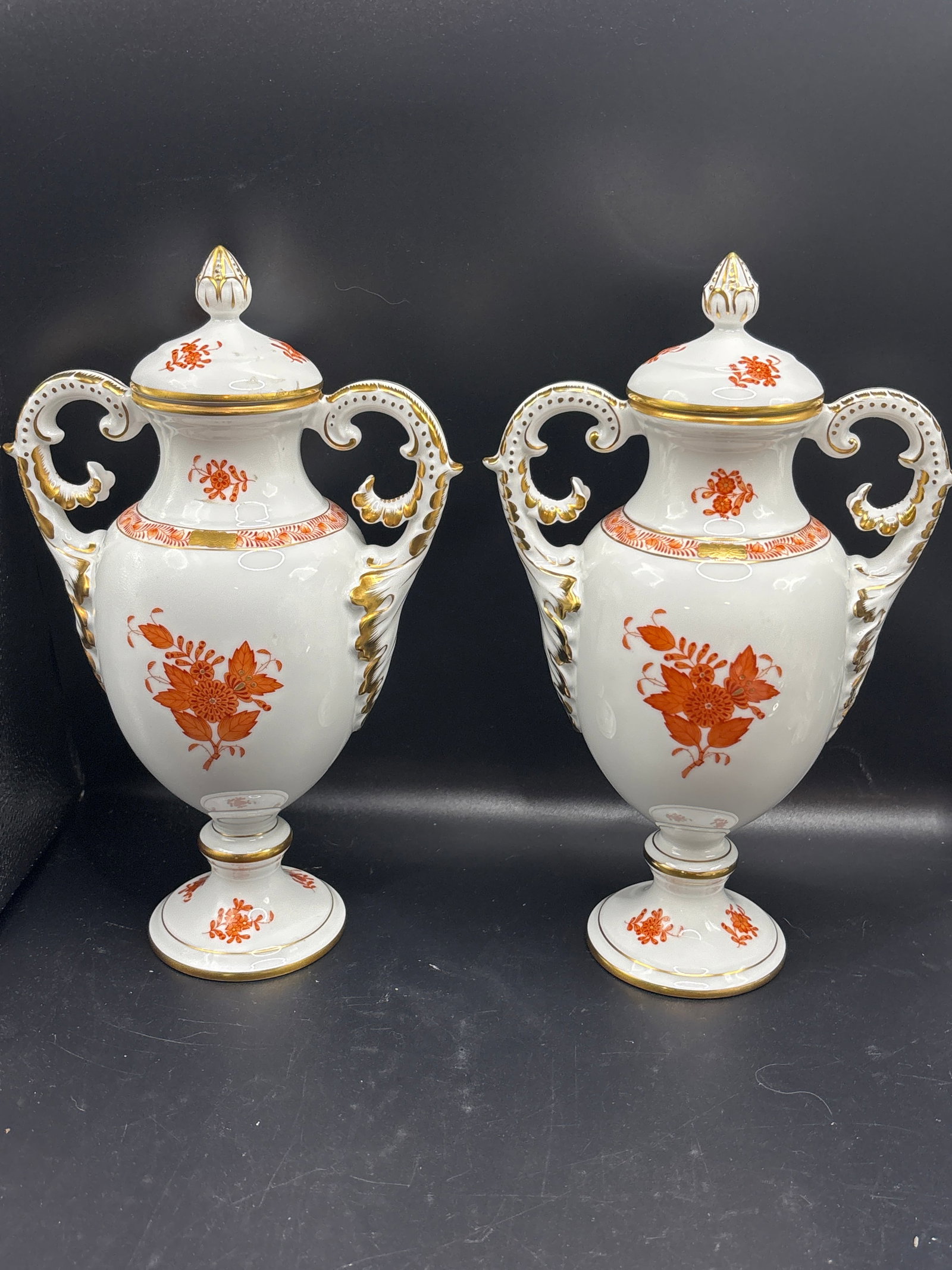 pair of Herend Hungary fine porcelain footed 10.5 inch lidded urns; #6492: pair of Herend Hungary fine porcelain footed lidded urns decorated in the classic Chinese Bouquet Rust (AOG) pattern.Key Characteristics & Details* Manufacturer: Handcrafted by the historic Herend Por