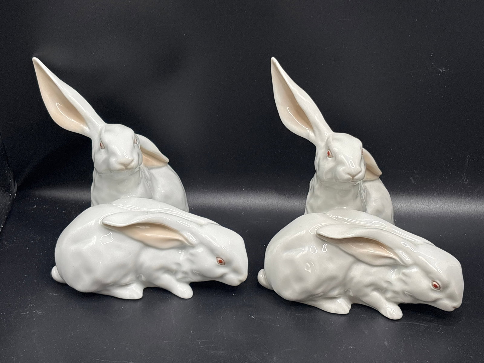 Two pair vintage Herend Hungary white porcelain rabbit figurine 5 inch group: Two pair vintage Herend Hungary white porcelain rabbit figurine group on a base. [1]This classic design features a pair of long-eared albino rabbits crafted out of plain white undecorated porcelain, d