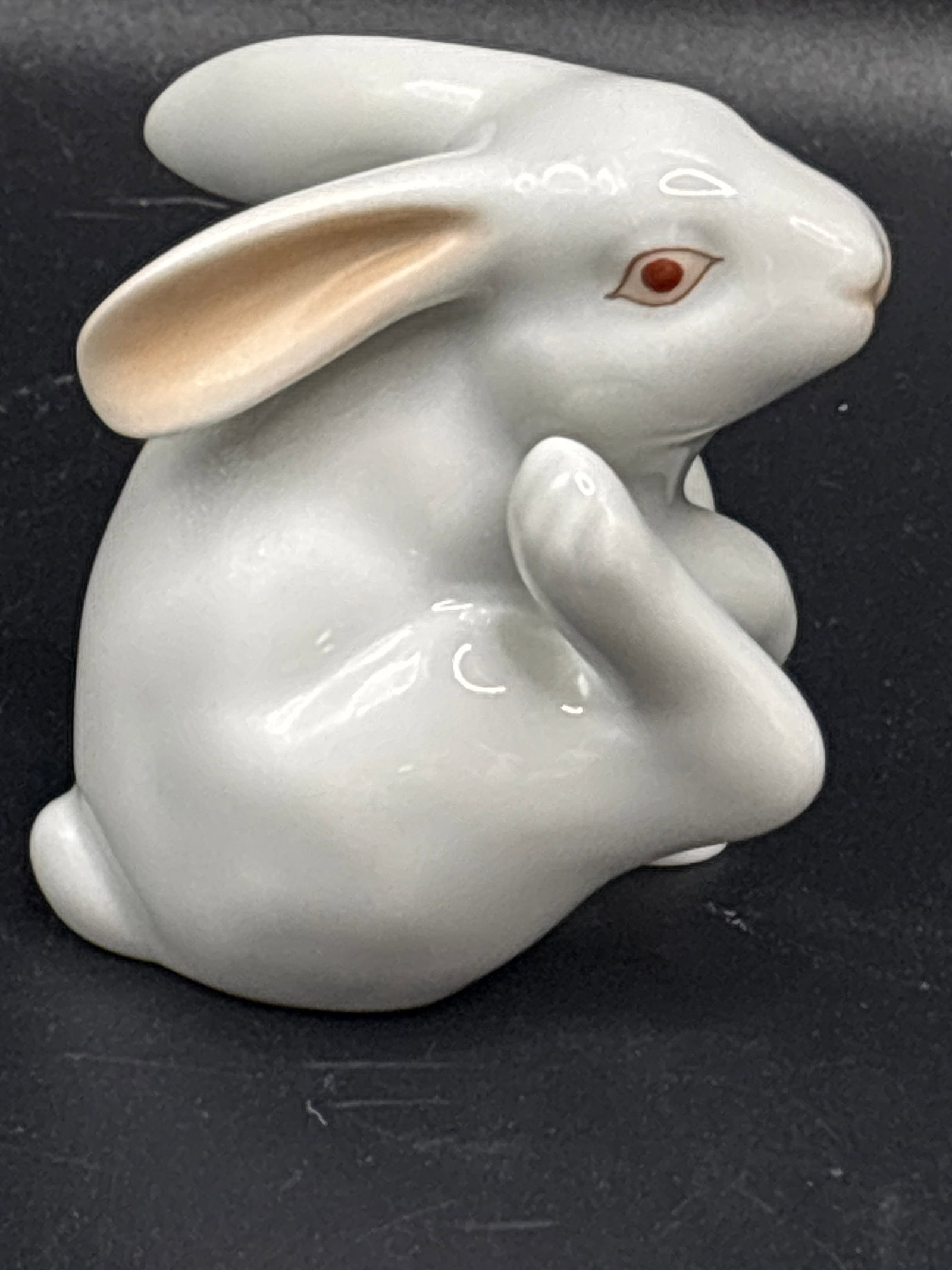 vintage Herend Hungary white porcelain rabbit figurine 3inch figure: 3 inch Herend Porcelain White Scratching Bunny Figurine. [1]Produced by the famous Herend Porcelain Manufactory in Hungary, this specific collectible showcases their hallmark pure white porcelain body
