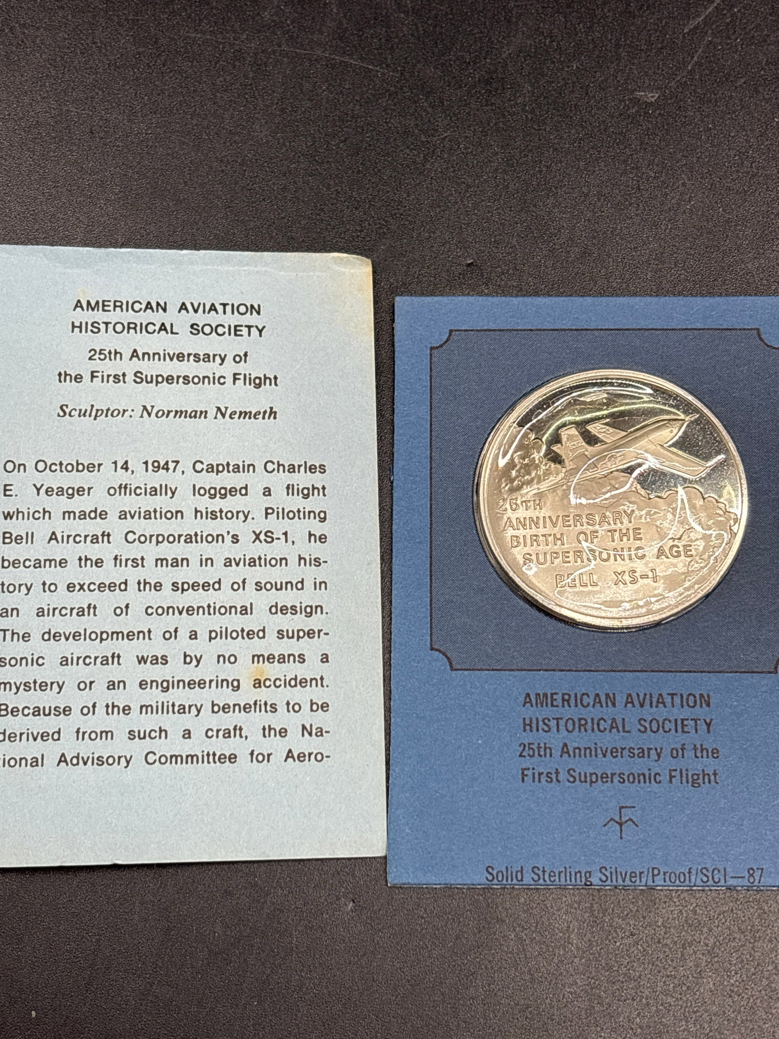 25 grams sterling American Aviation Historical Society First Supersonic Flight: American Aviation Historical Society 25th Anniversary of the First Supersonic Flight solid sterling silver proof medal.Commemorative proof medal featuring the Bell XS-1 aircraft.Issuer/Organization: