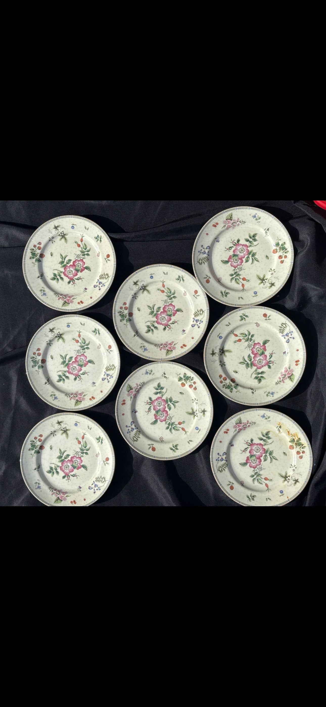 Set of eight 8&1/2 inch Wedgwood dinner plate in the Fleur pattern plates: 8&1/2 inch plates Wedgwood dinner plate in the Fleur pattern.Pattern DetailsThe Fleur pattern features a delicate design of pink and white flowers along with various fruits, including strawberries on 