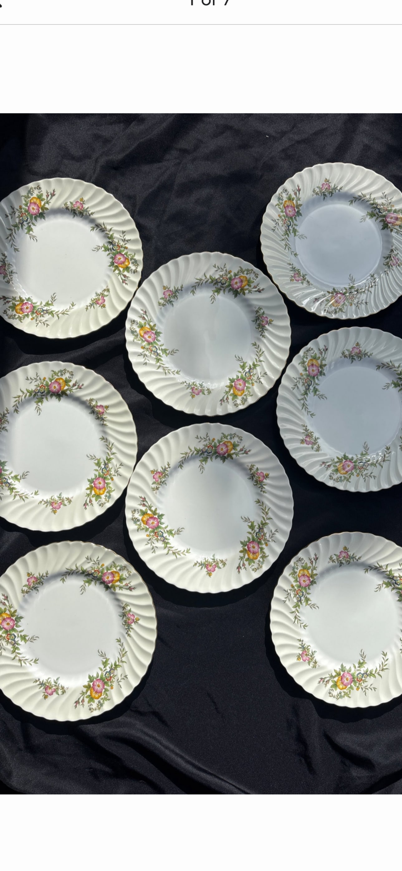 vintage Minton English fine bone china ‘York’ 10&1/2 inch dinner plates( number S501): vintage Minton bone china dinner plates in the "York" pattern (number S501), manufactured in England between 1941 and 1969. Design: Features a swirled rim with pink and yellow floral sprays on a cream