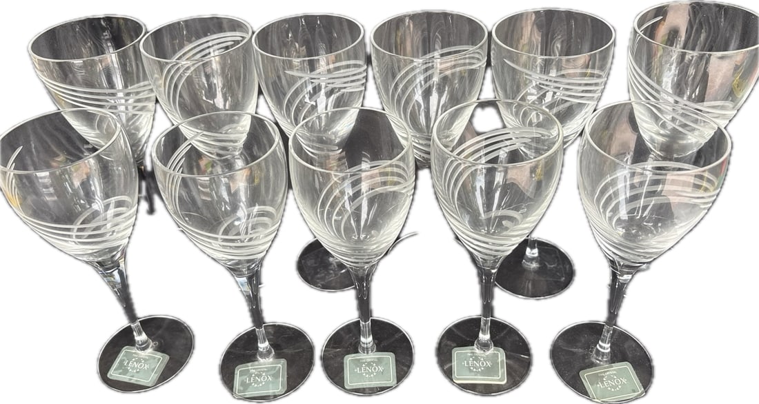 Set of eleven Lenox Windswept wine glasses: Set of eleven Lenox Windswept wine glasses, recognizable by their frosted, spiral-cut design.They are manufactured from mouth-blown crystal.Set of six 8&1/2 inch and five 8 inch.This pattern was produ