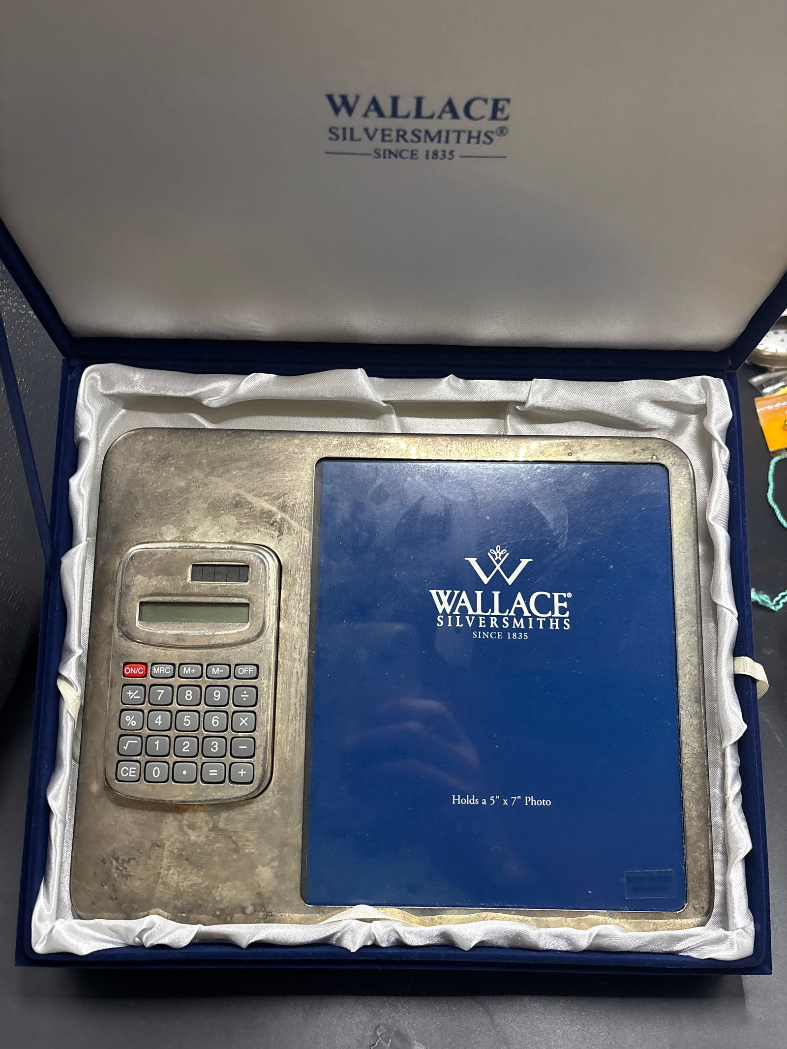 Wallace Silversmiths Silver Plated Removable Calculator Frame Gift Set: Wallace Silversmiths Silver Plated Removable Calculator Frame Gift Set, which features a silver-plated combination frame and a detachable solar-powered calculator inside a blue presentation box