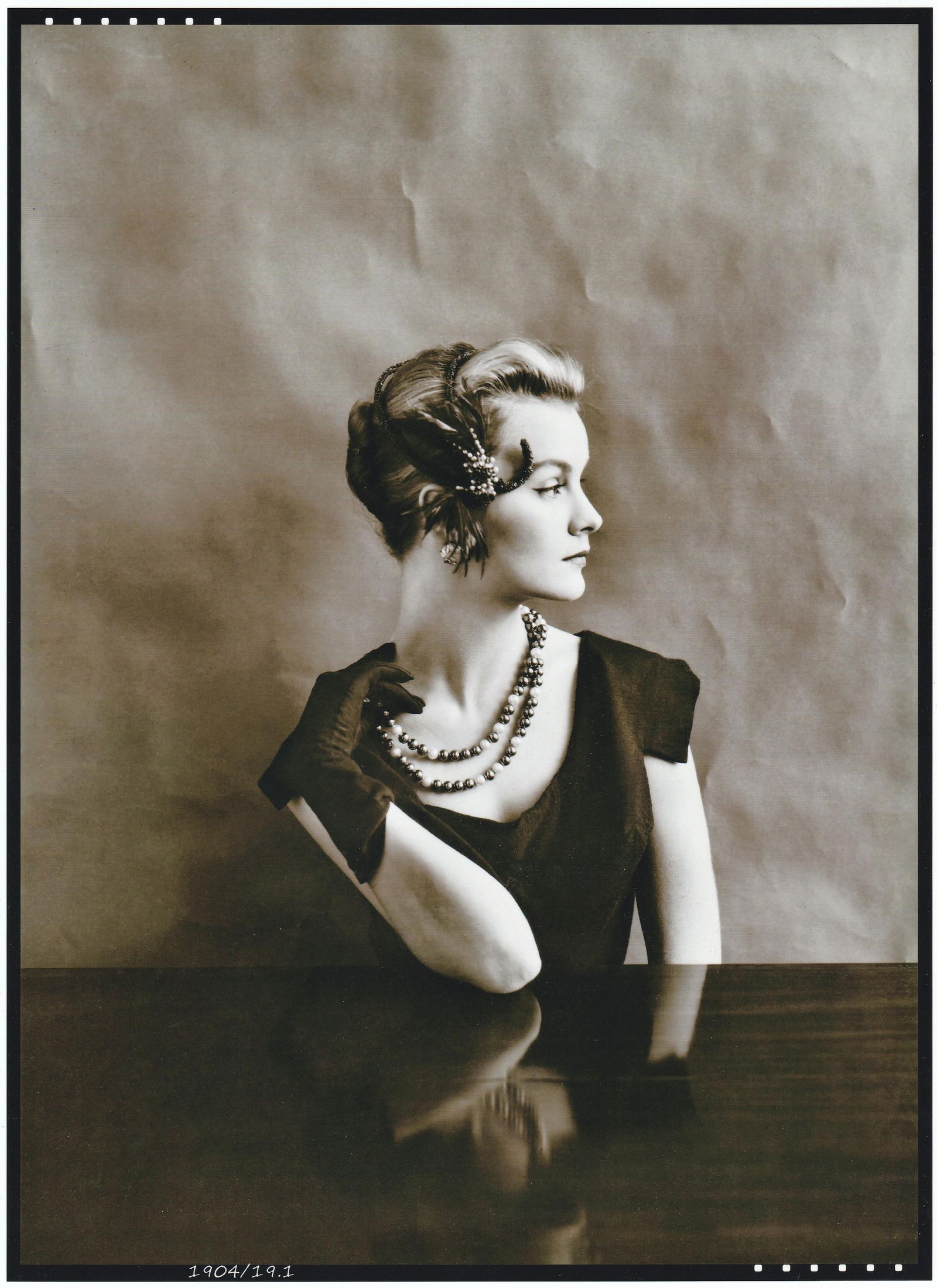 Guy Bourdin (1928-1991), Model Wearing a Hat by Svend Millinery, 1955 (1 of 2)