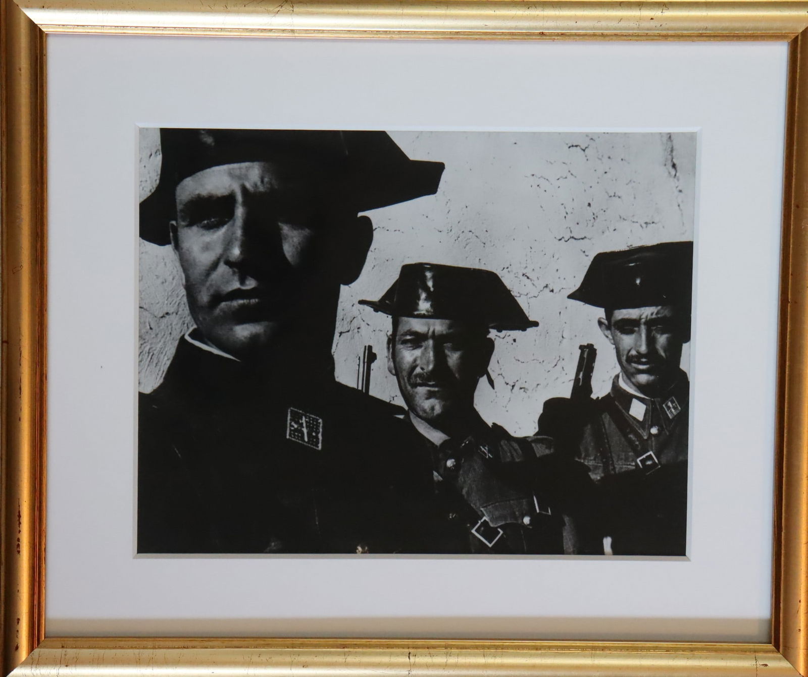 W. Eugene Smith (1918-1978), Guardia Civil, Spanish Village, 1951: W. Eugene Smith (1918-1978), Guardia Civil, Spanish Village, 1951, H x L: 25.3 x 20.3 cm, gelatin silver, features the Estate-stamp on verso.