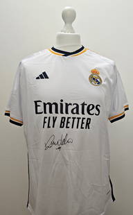 Ronaldo Luis Nazario de Lima Signed Real Madrid CF Home Shirt (ICONS Authenticated): Real Madrid home jersey, signed by Ronaldo Luis Nazario de Lima. The white shirt features the club crest and sponsor details on the front, with the signature placed below. Included is an ICONS certifi
