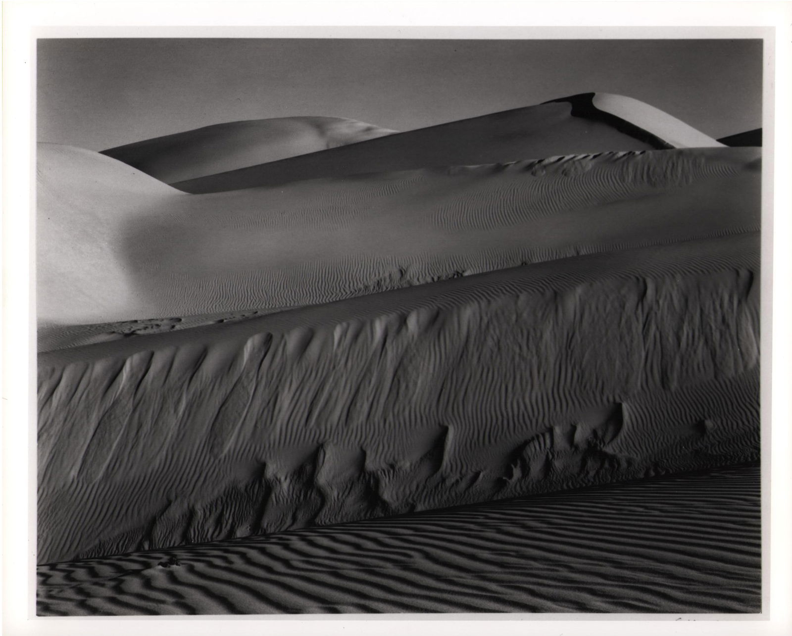 Edward Weston (1886-1958), Sand Dunes Oceano, CA, 1936: Edward Weston (1886-1958), Sand Dunes Oceano, CA, 1936, H x W: 25.4 x 20.4 cm, silver gelatin print. Features the International Museum of Photography stamp verso (George Eastman House), and an archiva