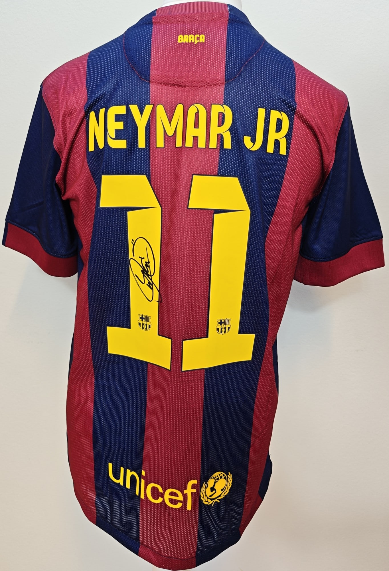 Neymar Signed Barcelona 2014-15 Shirt #11, COA: Neymar Jr, "FC Barcelona 2014-15 home shirt #11", a jersey signed in black marker above the #11. Authenticated by Exclusive Memorabilia (signed Santos, 20 March 2025), with hologram 66678 and COA no. 