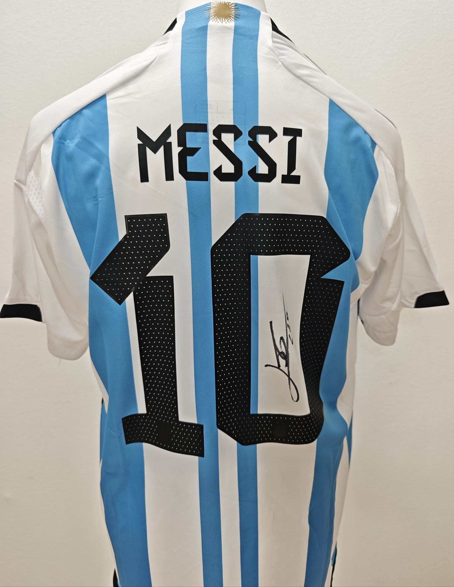 Messi Signed Argentina World Cup Shirt ICONS COA: Lionel Messi, "Argentina World Cup home signed jersey". The back of the jersey is signed by Messi in black marker on the number. Accompanied by an ICONS.com COA, item code I2330, and hologram 00008046