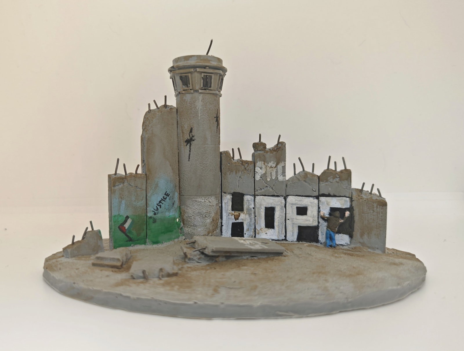 Banksy, "Walled Off Hotel Sculpture (Hope)", 2018: Banksy (b. 1973), "Walled Off Hotel, Big Sculpture w. Tower (Hope)", 2018, 19 × 13 cm, hand-embellished cast resin. Titled and stamped.