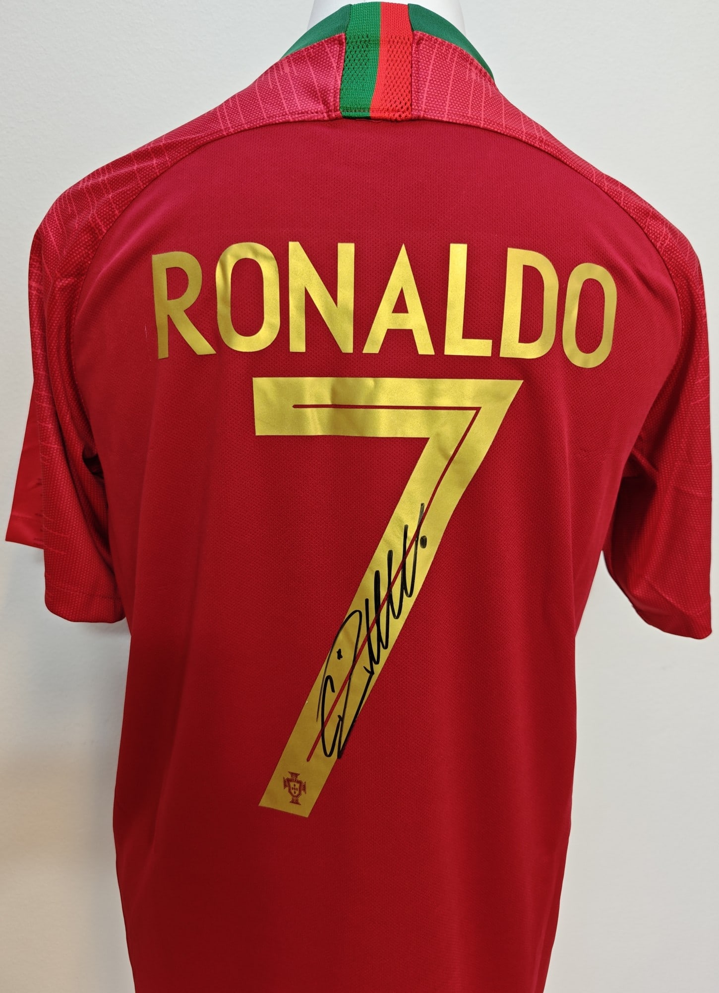 Ronaldo Signed Portugal 2018 Shirt #7 ICONS COA: Cristiano Ronaldo, "Portugal 2018 home shirt #7", a jersey signed on the #7 back in black marker. The shirt is Icons.com authenticated, certificate no. ICCRPS18.
