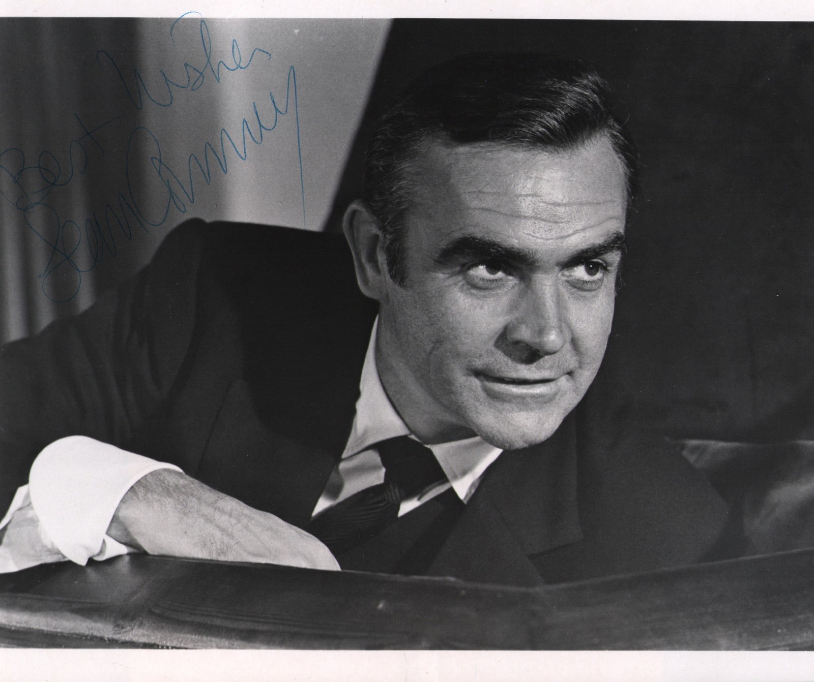 Sean Connery Signed James Bond Photo, 1981: Sean Connery, "James Bond, Diamonds Are Forever", 1981, black and white press photograph, 20.3 × 25.4 cm. Signed in blue ink and dated 12/29/81; the verso bears ABC caption slips, ref 11652A-4.