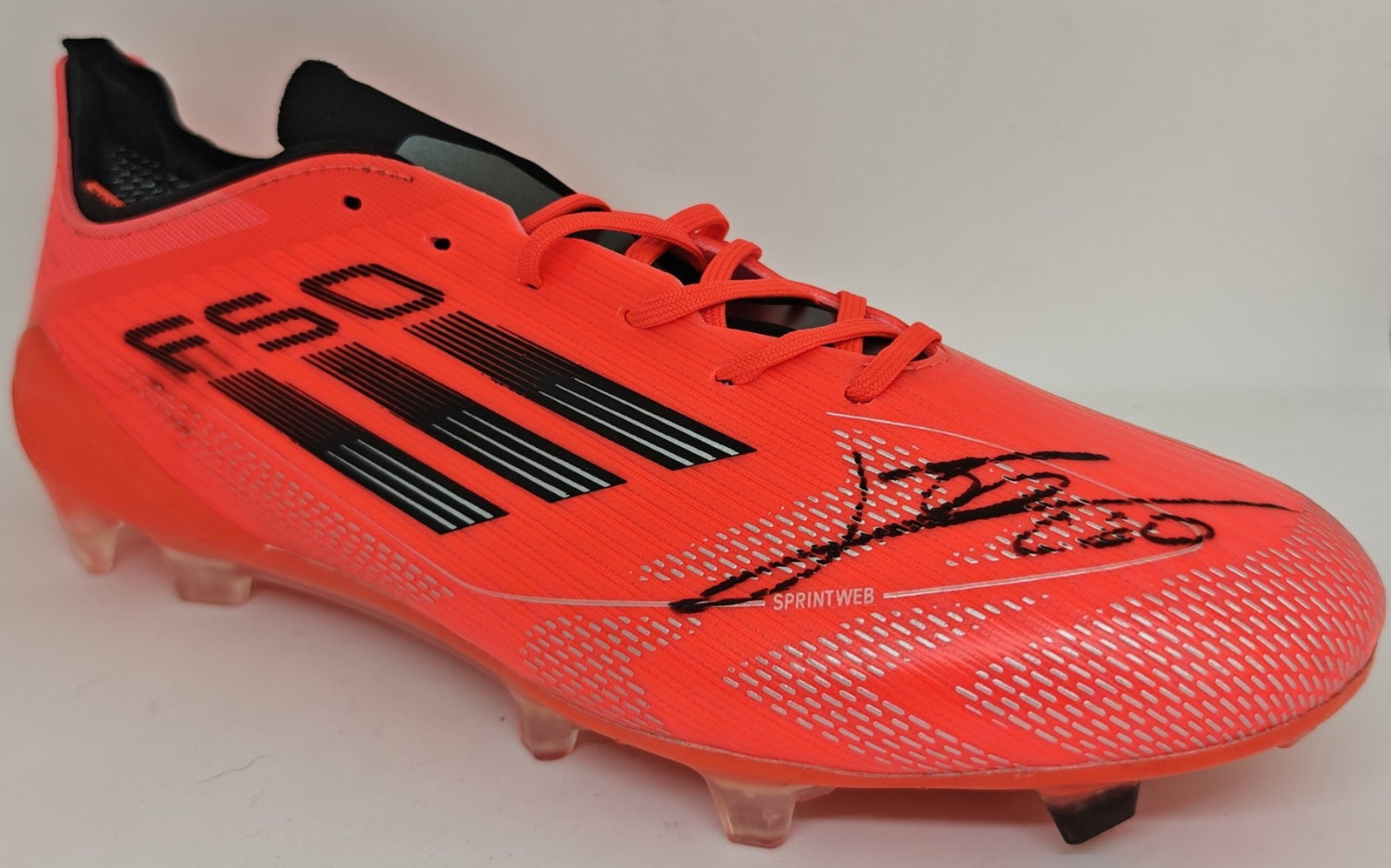 Messi Signed F50 Boot 2022 World Cup ICONS COA: Lionel Messi, "Adidas F50 football boot", official 2022 FIFA World Cup edition. Signed by Messi in black marker; accompanied by an ICONS.com COA with hologram 000074332.