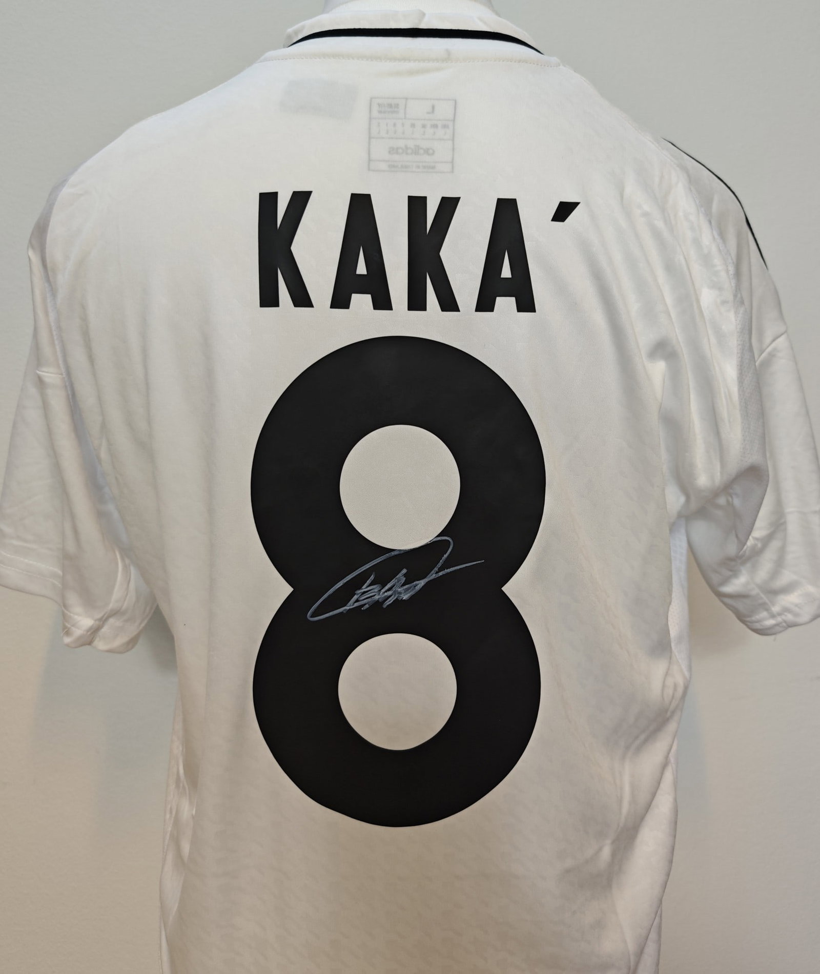 Kaká Signed Real Madrid 25-26 Shirt #8 ICONS COA: Kaká, "Real Madrid 2025-26 home shirt #8", jersey. Signed in silver pen on the #8 on the back and authenticated by Icons.com (signed 07/10/25, certificate I5344D).