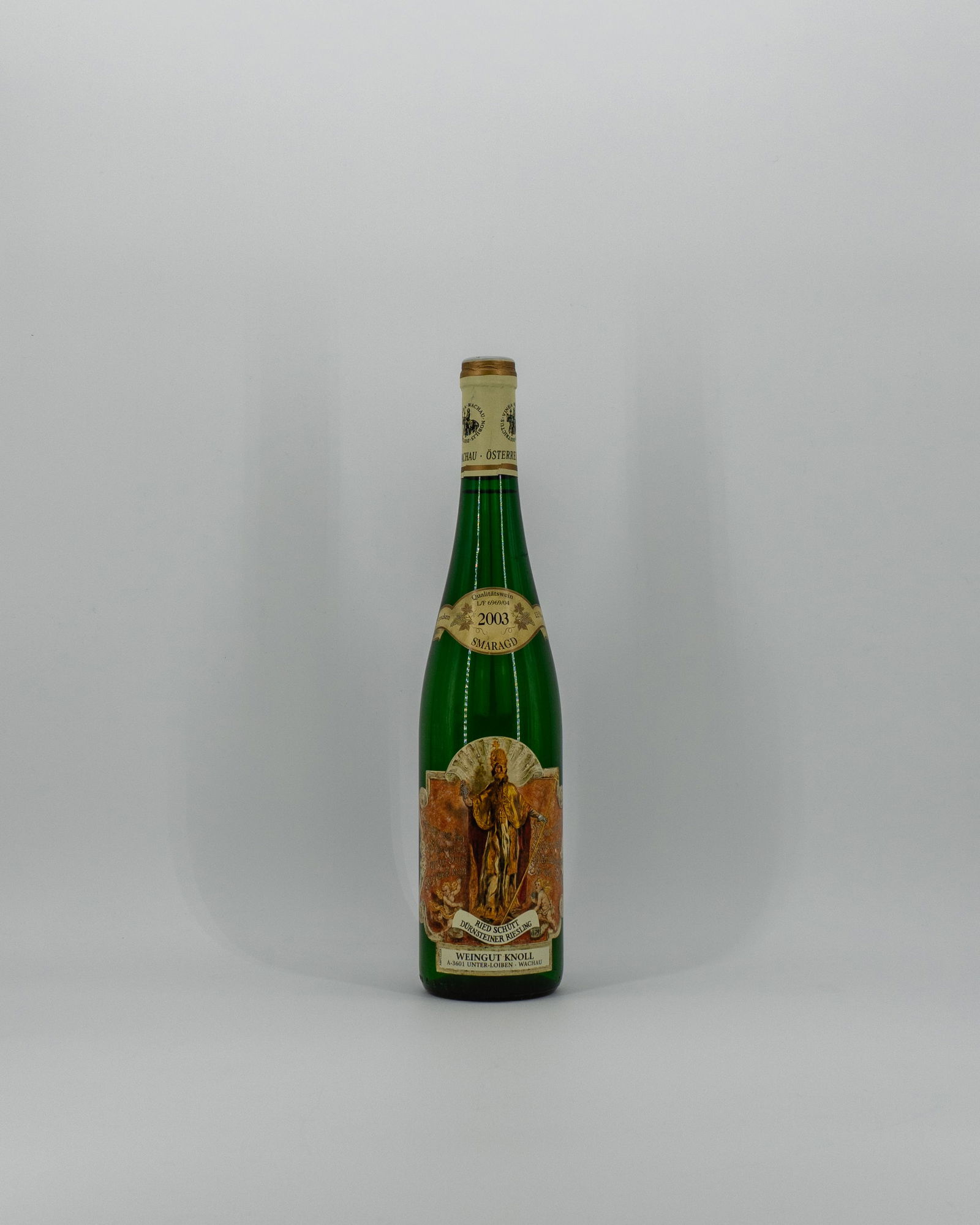 2003 Knoll Ried Schuett Riesling Smaragd: 2003 Knoll Ried Schuett Riesling Smaragd2003 Knoll Ried Schuett RS Sm is in good condition. The level has decreased minimally and the cap of the wine has loosened slightly over time.