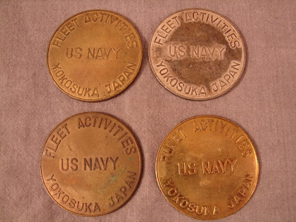 Lot of 4 US Navy Fleet activity tokens: Unique lot from a Japanese Naval Fleet Commanders estate is a lot of 4 US Navy Fleet activity tokens. Scarce collectible.