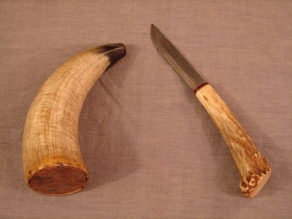 Antique named powder horn and patch knife: Antique named pistol or priming powder horn and patch knife. The powder horn is "as found" with the name of D.B Grim, Grimsville, Berks County Pennsylvania. Grimville was founded by D.B Grim who was a