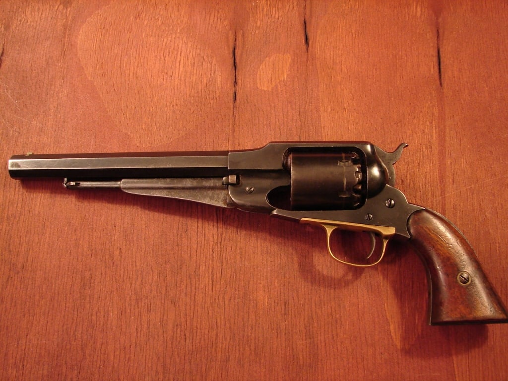 Remington Model 1858 percussion pistol: Civil War era Model 1858 percussion pistol. Very good overall condition. Grips are correct Remington but worn or shrunken. See photos as part of the description. Classified as an antique due to manufa