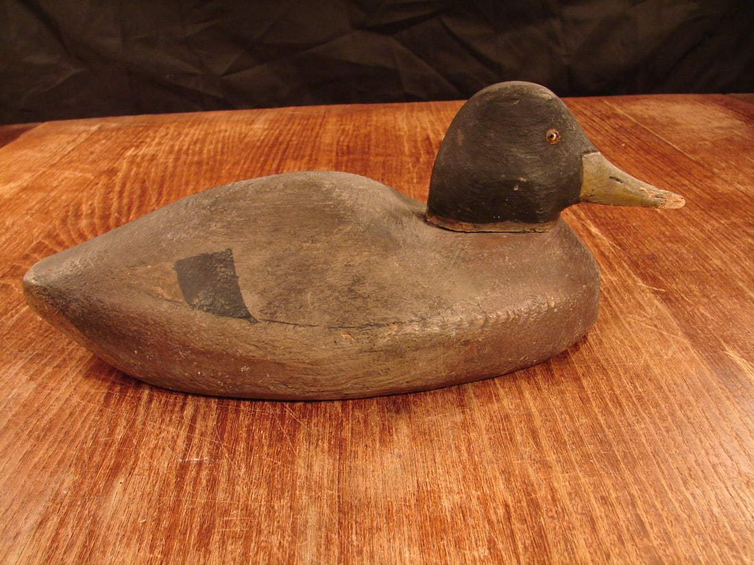 Antique duck decoy: Antique duck decoy. Hand carved and painted? Humpback.