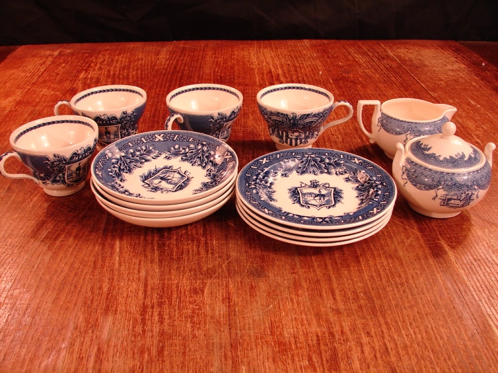 Wedgwood United States Military Academy china set: 14 piece lot of Wedgwood United State Military Academy china set. Includes coffee/tea set. 4 cups, 4 plates, 4 cup saucers 1 sugar bowl, 1 creamer bowl. All in blue.