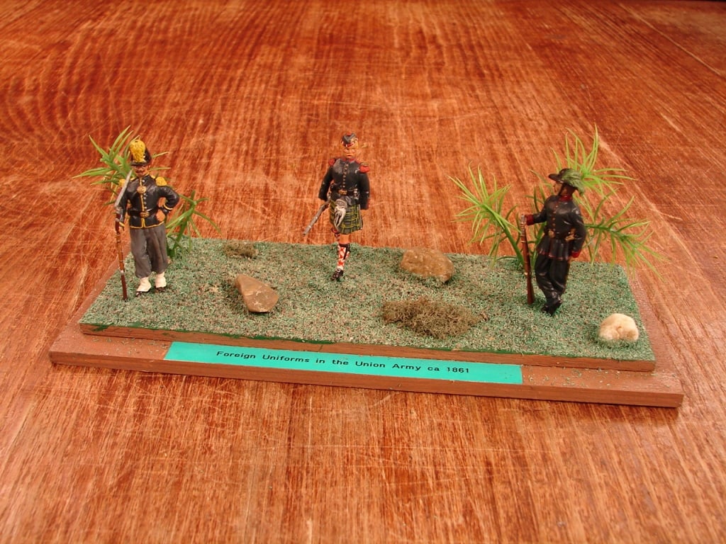 Civil War hand painted lead soldier scene.: Civil War hand painted lead soldiers depicting the foreign uniforms in the Union ranks.