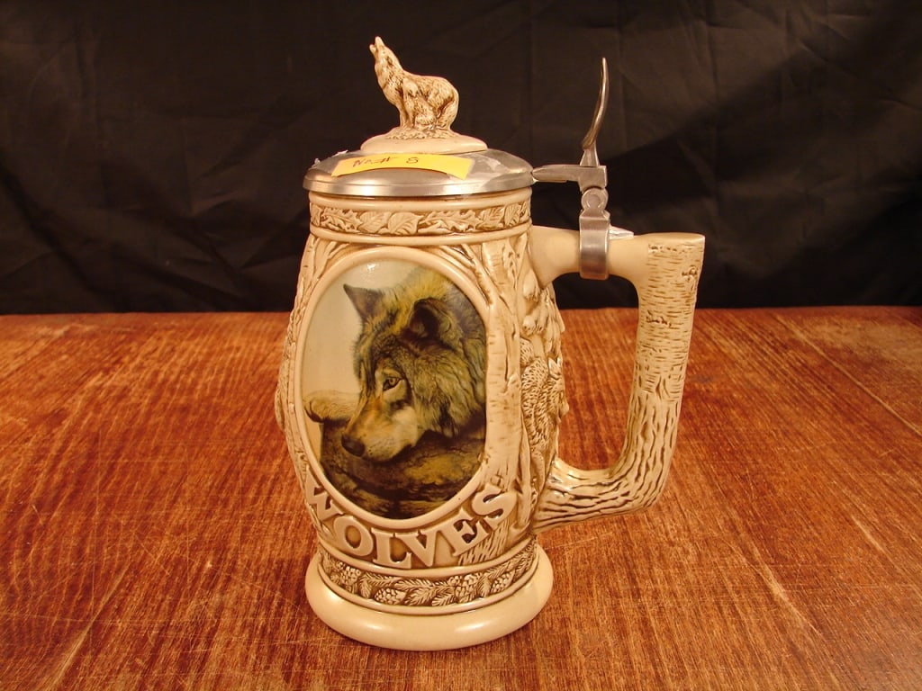 Avon 1997 Tribute to the N American Wolf Stein: Avon 1997 Tribute to the North American Wolf Stein Pewter Lid, Ceramarte Brazil, 9 ½ inches tall and 4 inches wide base.