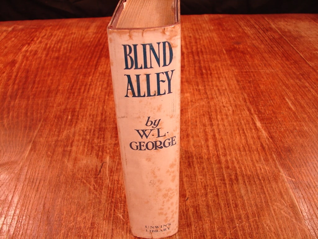 Blind Alley by W.L. George. London 1919 1st print: Blind Alley by W.L. George. London 1919. First printing. The story follows Richard Larch, a "gallant gentleman," as he navigates the upheaval of the Great War. It explores his inner spiritual journey