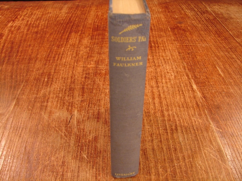 Soldier's Pay by William Faulkner: Soldier's Pay by William Faulkner. Horace Liveright 1926. This is William Faulkner's debut novel, exploring the disillusionment and psychological scars of World War I through the homecoming of a