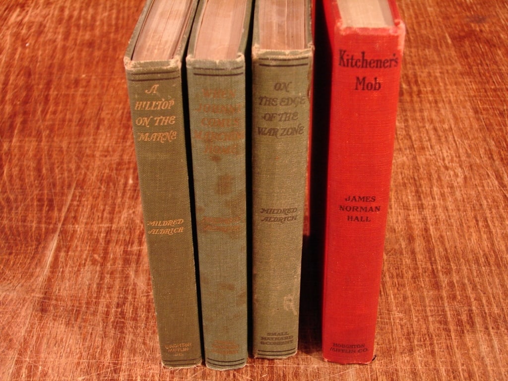 Lot of 4 World War I novels: Lot of 4 World War I books. 1) Kitchners Mob by James Norman Hall. Houghton Mifflin 1916. A 1916 memoir by James Norman Hall, chronicling his experience as an American volunteer in the British Army du