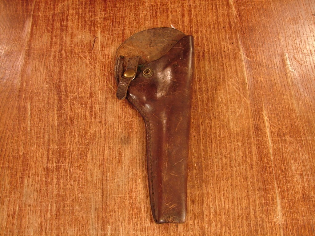Leather snap holster for .38 DA: Leather snap holster for .38 DA . Owners name faintly on the back side.