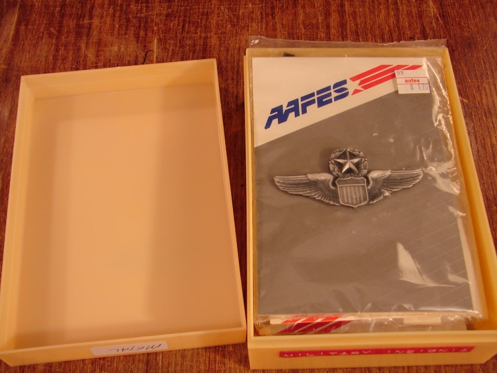 Lot of 7 military insignias AAFES various ranks: Lot of 7 military insignias AAFES various ranks, etc. All new in wrappers. Unused.