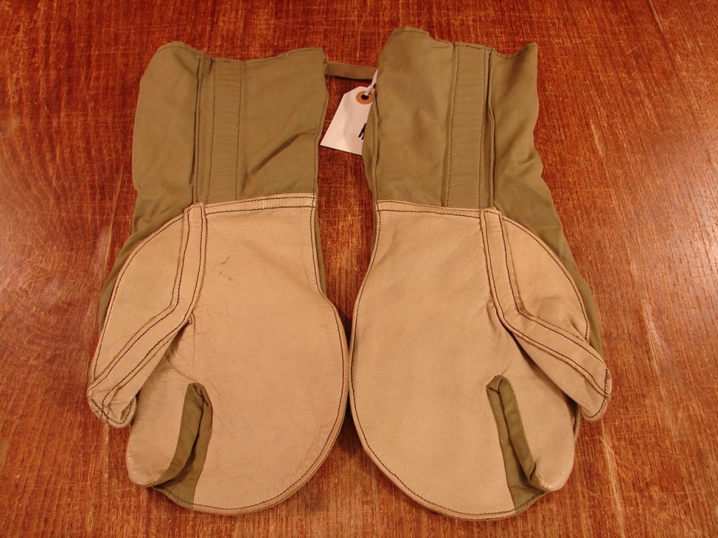 WWII or Korean era cold weather mittens: WWII or Korean era cold weather mittens with 5 finger wool inserts. Un-issued.