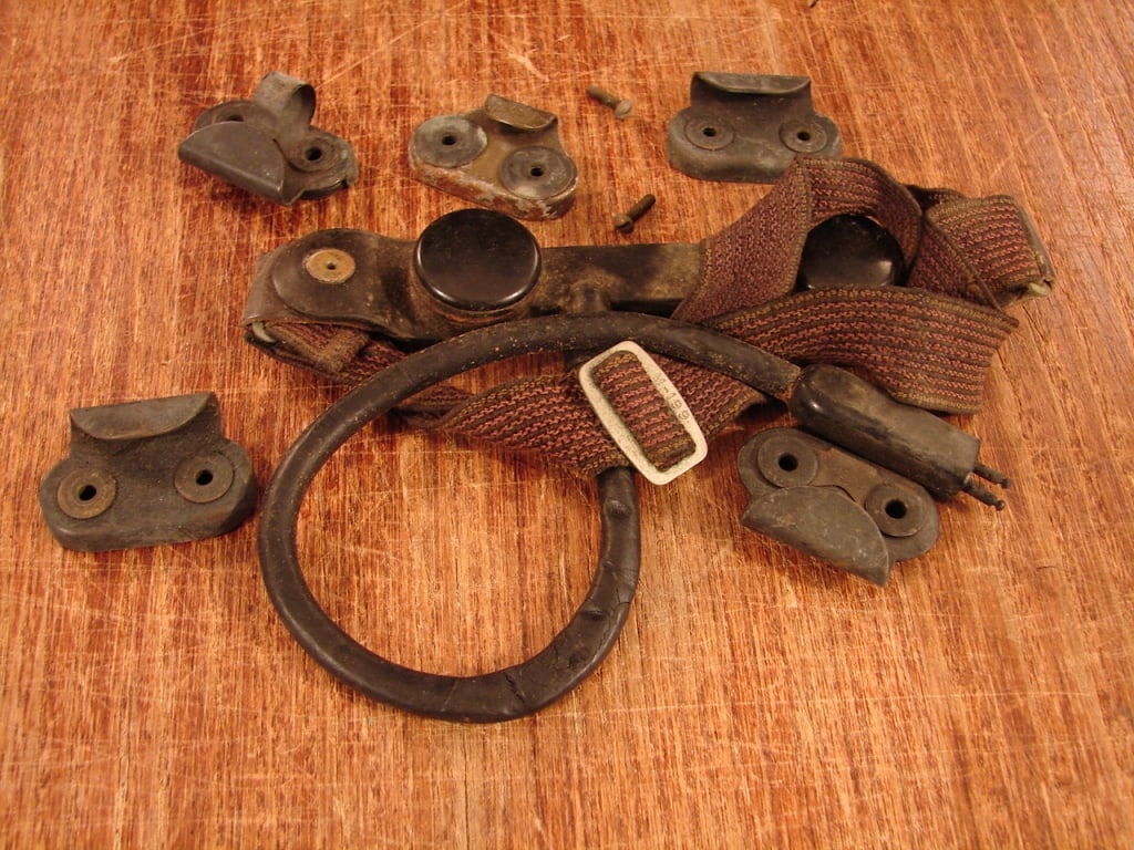 WWII Throat microphone and Oxygen mask fasteners (1 of 3)