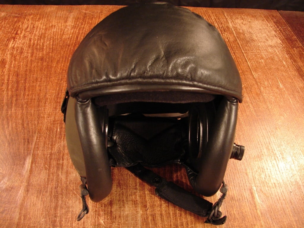 Un-issued Helicopter pilot or flight helmet: Un-issued Military Helicopter pilot or flight helmet in period bag. With new visor and pads. Very neat.