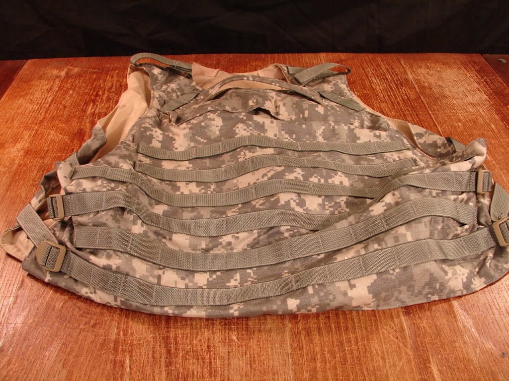 8 Pieces of Point Blank Body Armor: 8 Pieces of Point Blank Body Armor. Including vest and several panels. Shells only. See photos as description. No plates.
