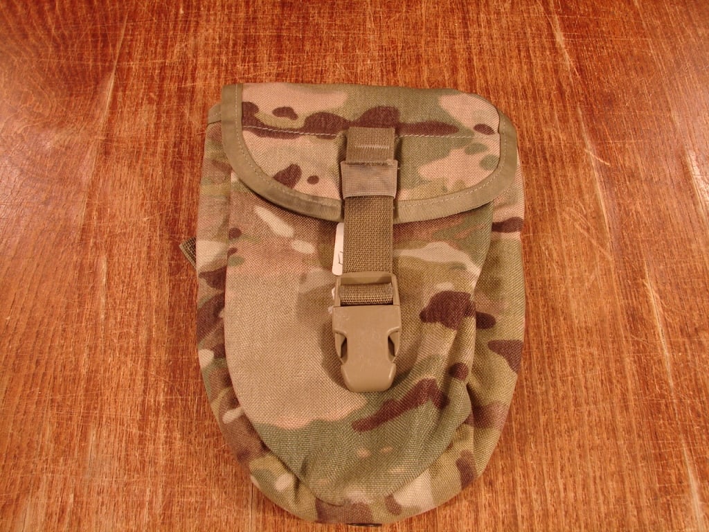 US Military Molle -ll entrenching tool in Camo: US Military Molle -ll entrenching tool Camo with extra buckles.